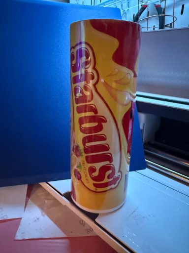 Yellow cylindrical container labeled "Spaghettios" with red accents.
